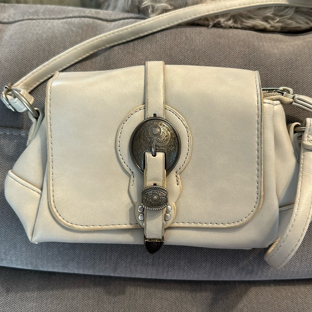 Small but roomy ivory western inspired cross body buckle bag or shoulder purse